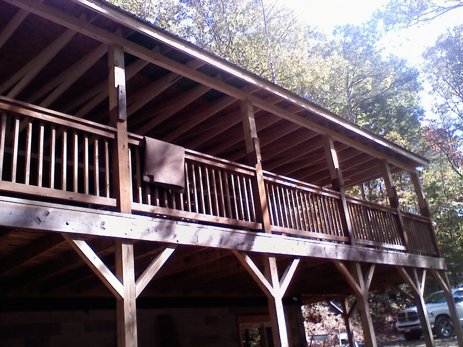Timber framing under a new elevated porch and deck — Roof Leak Repair in Odessa by Roofing Brothers